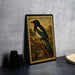 a framed painting of a black and white bird perched on a branch, set against a natural landscape.