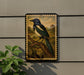 a framed painting of a blue and green bird perched on a branch, set against a backdrop of a natural landscape.