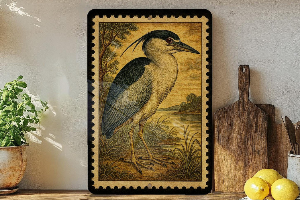 a framed painting of a heron standing on a grassy area, with a wooden cutting board and a potted plant nearby.