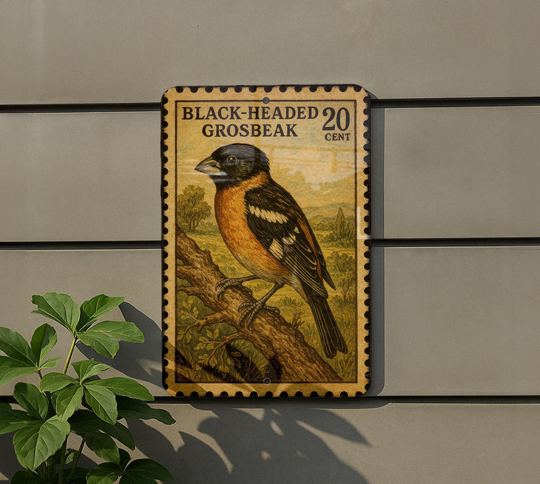 A postage stamp-like sign featuring a colorful illustration of a black-headed grosbeak perched on a branch, mounted on a wall.