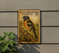 A postage stamp-like sign featuring a colorful illustration of a black-headed grosbeak perched on a branch, mounted on a wall.