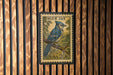 A postage stamp featuring a blue jay perched on a branch, with the text "BLUE JAY" and "USA 20¢" printed on it.