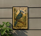 A postage stamp featuring a blue jay perched on a branch, with the text "BLUE JAY" and "USA 20¢" printed on it.