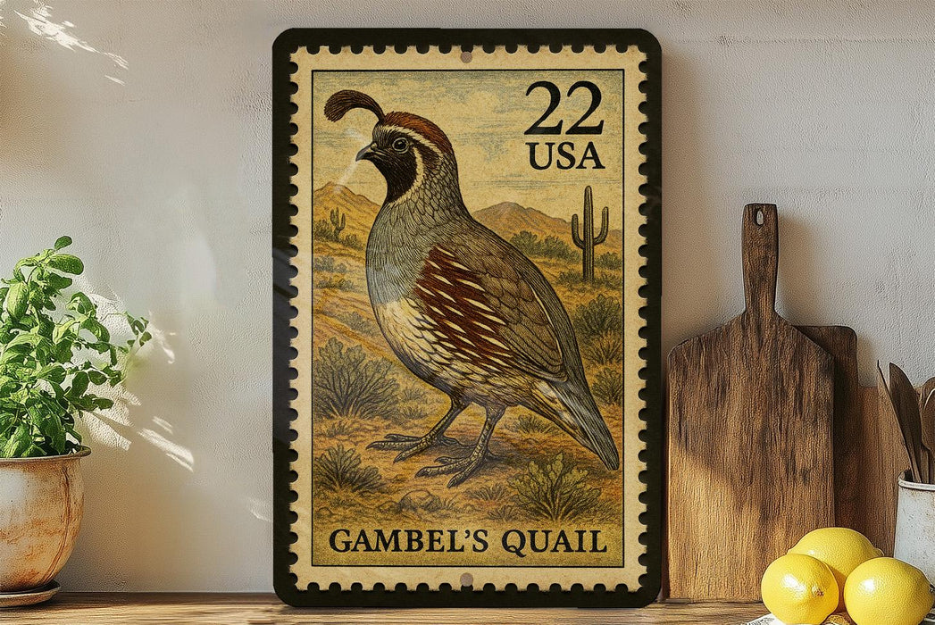 A framed postage stamp featuring a quail bird, with the text "GAMBEL'S QUail" printed on it. The stamp is placed on a shelf next to a wooden cutting board and a potted plant.