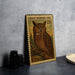 A Great Horned Owl postage stamp from the United States, featuring a detailed illustration of the owl perched on a branch.
