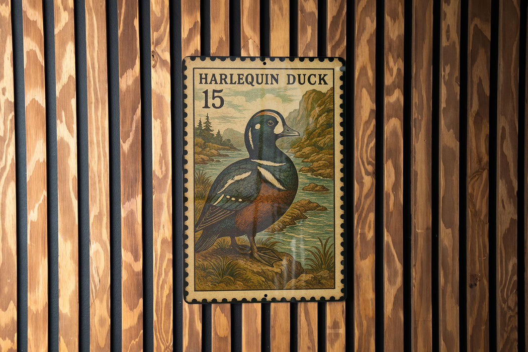 A vintage postage stamp featuring a harlequin duck, with the text "HARLEQUIN DUCK 15" printed on it.