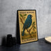 A vintage U.S. postage stamp featuring a blue bird perched on a branch, with the text "INDIGO BUNTING" and "U.S. POSTAGE" printed on it.