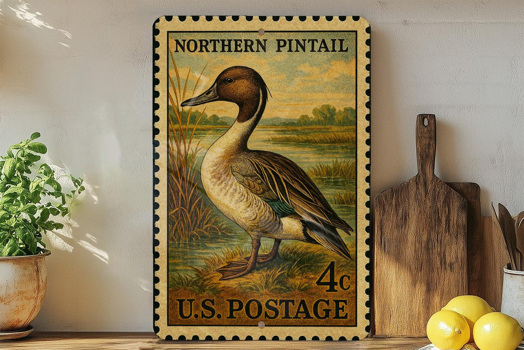 A vintage postage stamp featuring a duck on a grassy landscape, with the text "NORTHERN PINTail" and "4c U.S. POSTAGE" printed on it.