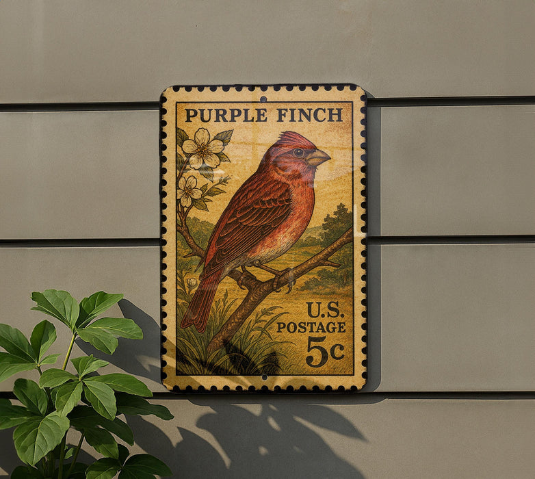A vintage Purple Finch postage stamp is displayed on a wall, featuring a detailed illustration of the bird perched on a branch.