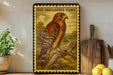 A framed illustration of a red-shoulderred hawk is displayed on a wall, with a wooden cutting board and a potted plant to the side.