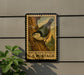 A postage stamp featuring a white-breasted nuthatch perched on a tree branch, with the text "WHITE-BREASTED NUTHATCH U.S. POSTAGE" printed on it.