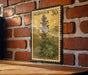 a vintage-style stamp with a floral design, mounted on a brick wall.