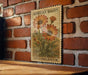 a vintage-style stamp or postcard with an illustration of a flower, specifically an African daisy, mounted on a brick wall.