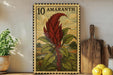 a stamp-like artwork depicting a red plant with green leaves, placed on a shelf next to a wooden cutting board and a potted plant.