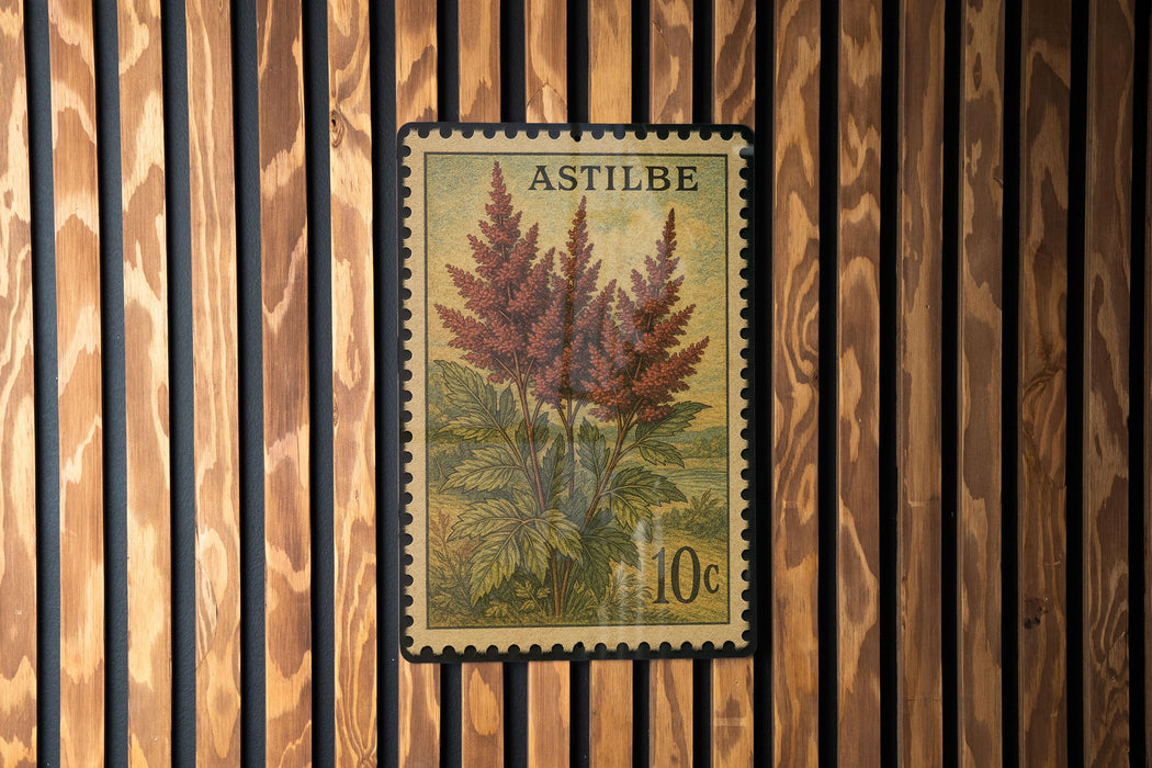 A 10c postage stamp from the country of Astilbe, featuring a floral illustration of a plant.