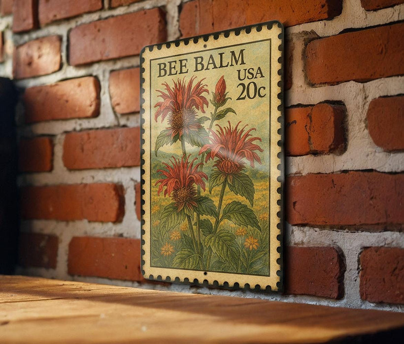 A vintage-style stamp featuring a floral illustration of red flowers, mounted on a brick wall.
