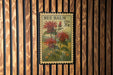A vintage 20c United States postage stamp featuring a floral design with red flowers and green leaves.