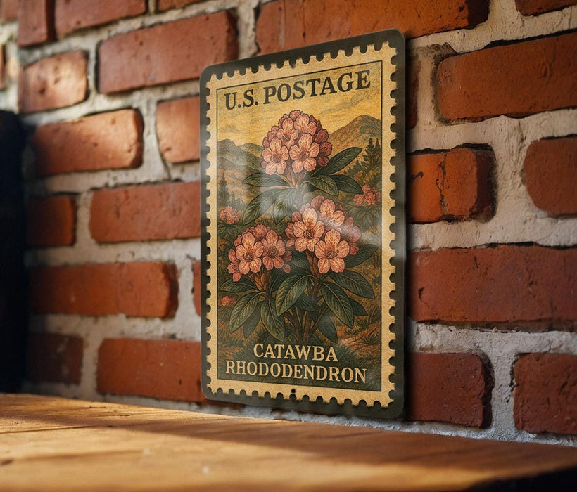 A vintage-style U.S. postage stamp featuring a floral design, mounted on a brick wall.