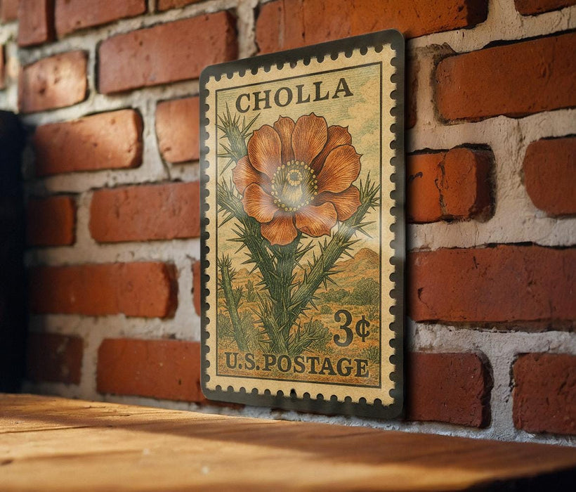 A vintage postage stamp featuring a large orange flower is displayed on a brick wall.