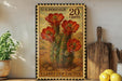 A framed U.S. postage stamp depicting a Claret Cup Cactus, with a wooden cutting board and lemons visible in the background.