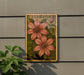 A framed botanical illustration of clematis flowers is displayed on a wall, with a potted plant visible to the left.