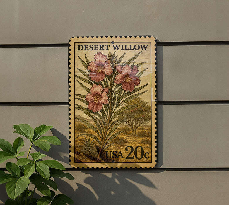 A vintage Desert Willow postage stamp from the United States, featuring a floral illustration of pink flowers on a green background.