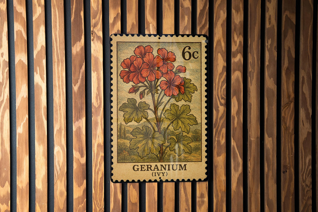 A vintage 6c postage stamp featuring a floral illustration of geranium flowers.