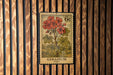 A vintage 6c postage stamp featuring a floral illustration of geranium flowers.