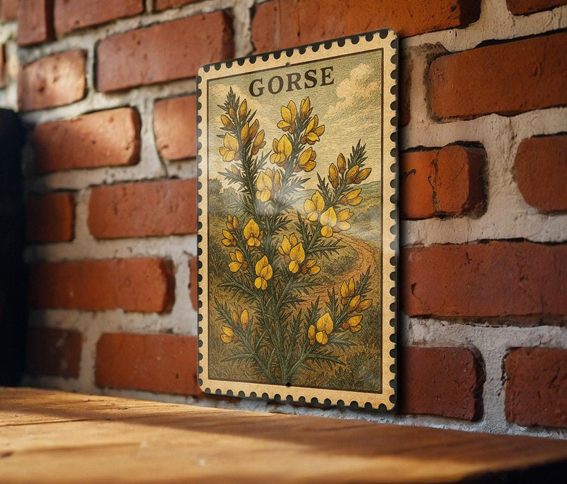 A framed illustration of a plant with yellow flowers is displayed on a brick wall.
