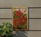 A vintage-style stamp or postcard with a floral design, featuring red flowers and green leaves, is displayed on a wall.