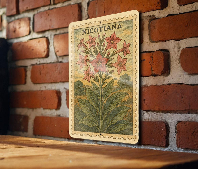 a vintage-style stamp or postcard with a floral illustration, hanging on a brick wall.