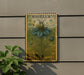 A vintage postage stamp featuring a large green flower with a yellow border, mounted on a wall next to a plant.