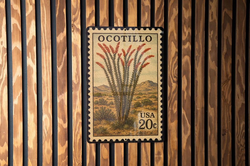 A postage stamp from the United States of America, featuring a desert plant with red flowers, mounted on a wooden wall.