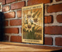 A wooden plaque with a painting of a yellow orchid flower is mounted on a brick wall.