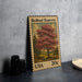 A 20 cent United States postage stamp from Redbud (Eastern) featuring a pink flowering tree.