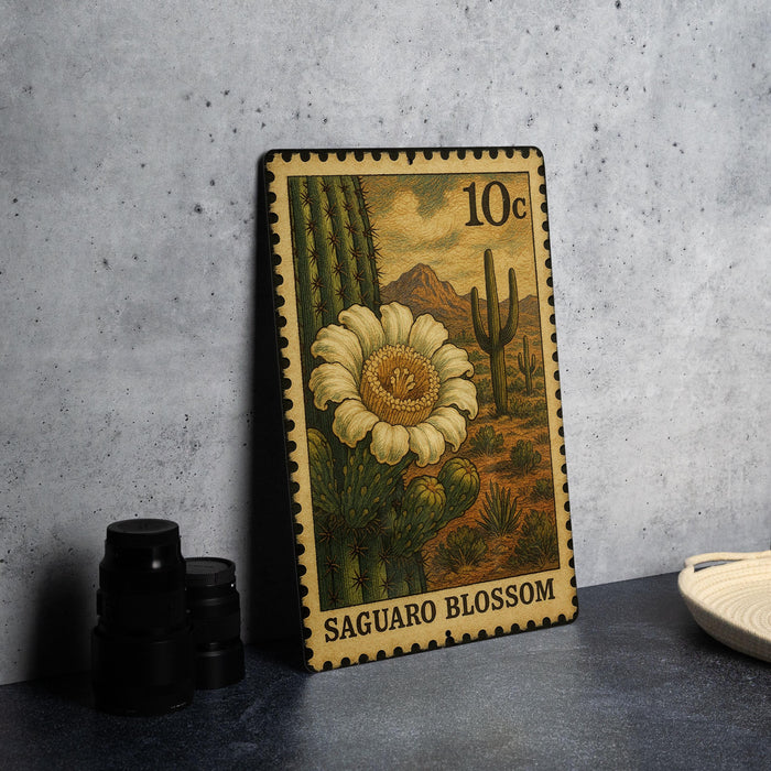 A 10 cent postage stamp featuring a cactus flower and a mountain in the background, with the text "Saguaro Blossom" printed on it.