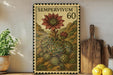 a vintage-style metal stamp with a floral design, placed on a wooden surface next to a potted plant and a wooden cutting board.