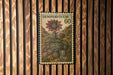 A vintage postage stamp featuring a floral illustration and the text "SEMPERVIVUM 60" is displayed on a wooden wall.