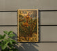 A postage stamp featuring a lily flower is displayed on a wall, with a plant to the left.