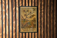 A vintage-style postage stamp featuring a witch hazel plant, with the text "Witch Hazel (Winter Bloom)" printed on it.