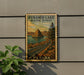 A vintage-style poster of Pyramid Lake, a scenic byway in Nevada, is displayed on a wall next to a plant.