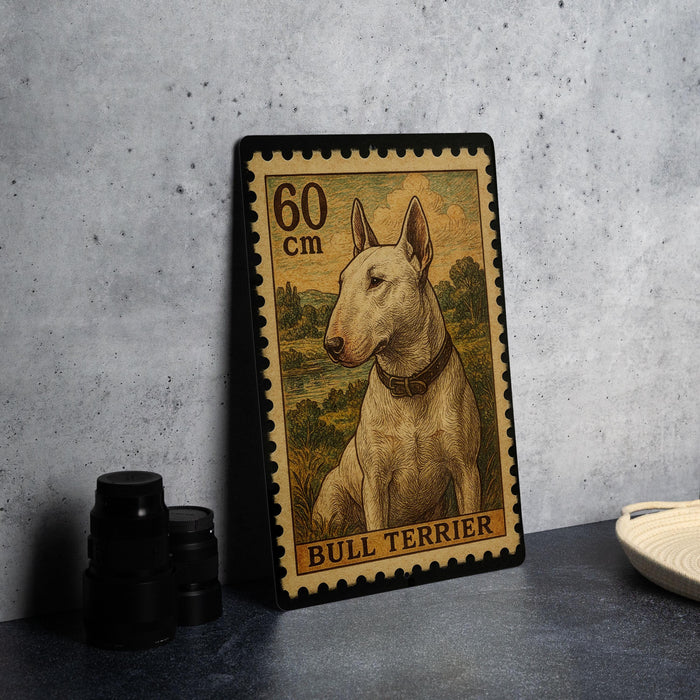 A metal stamp depicting a bull terrier dog, with the text "60 cm" and "BULL TERRIER" printed on it.
