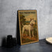 A bull terrier white dog standing on a grassy field, as depicted in a vintage-style illustration on a metal sign.