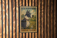 A U.S. postage stamp featuring a Great Dane dog in a field.