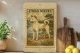 a framed illustration of a white dog, likely a breed called Jindo, standing in a natural setting with a potted plant and other kitchen items in the background.