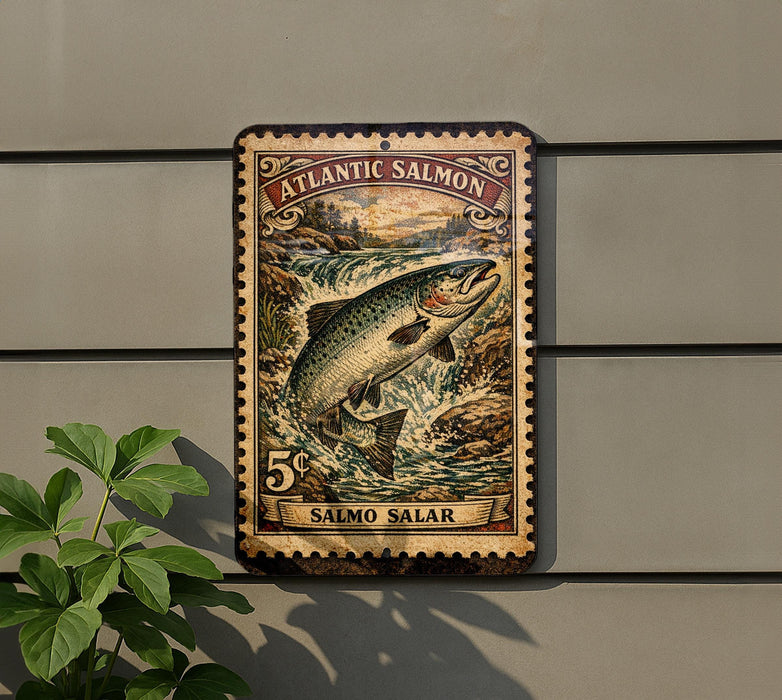 A metal sign with an illustration of a salmon jumping out of the water, mounted on a wall.