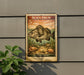 a vintage-style stamp or postcard with a black drum illustration, hanging on a wall next to a plant.