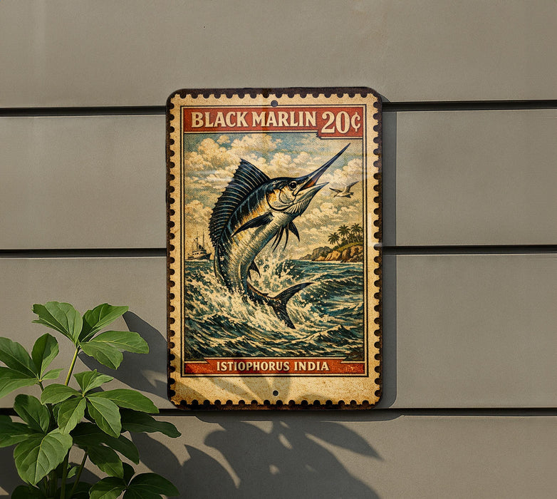 A vintage-style metal sign featuring a black marlin fish, mounted on a wall next to a plant.