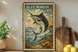 A framed vintage postage stamp depicting a blue marlin fish leaping out of the water, with a price of 10 cents.