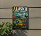 A vintage-style sign for the Alaska Botanical Garden, featuring a colorful illustration of various flowers and plants.